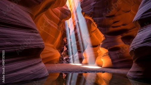 Antelope Canyons ethereal light beams illuminate the sandstone walls.