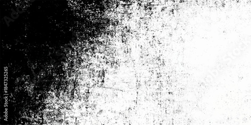 An abstract black and white grunge background featuring a textured liquid splash of cold water drops and ice on a rough frozen surface