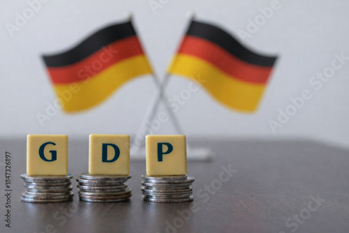Germany GDP concept with coin stacks and blocks symbolizing economic growth, global ranking, IMF data, United Nations reports, trade strength and tariff policies shaping performance outlook today. EU