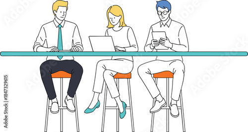 Three business professionals working together on a collaborative project using laptops and tablets while sitting at a long bar table