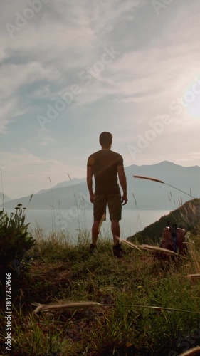 Wallpaper Mural mindful man at mountain sunrise meditation slow motion spiritual awakening nature connection Torontodigital.ca