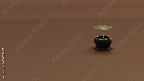 Minimal clover plant in dark ceramic pot on warm brown background