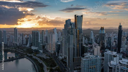 Photos Close aerial view of modern high-rise buildings in Panama City illuminated by wa