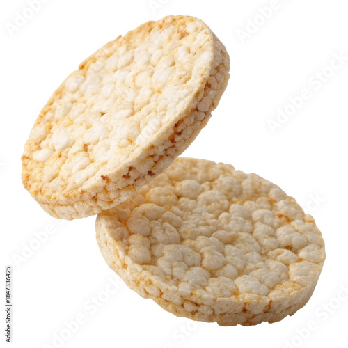 Rice cake puffed rice round snack crunchy food healthy snack diet food organic grain gluten free crispy texture light meal Two round puffed rice