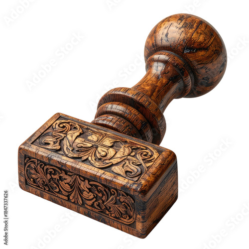 Ornate, wooden stamp with carved floral design and rounded handle