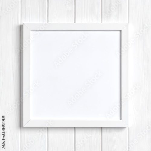 A stylish white frame elegantly hangs on a rustic wooden wall, showcasing its clean lines and contrasting beautifully with the warm, textured wood.