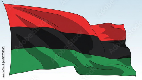 Pan african flag waving in the wind with red, black, and green colors