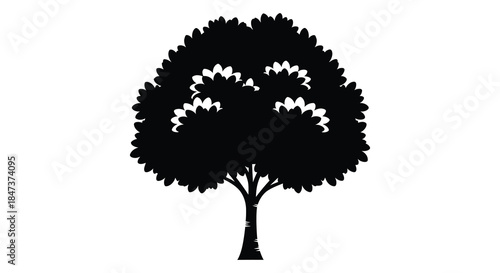 A striking black silhouette of a lush full tree with detailed foliage and a sturdy trunk silhouette