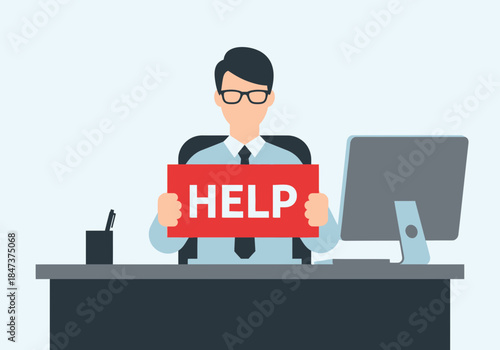 Businessman holding a red sign with the word HELP at his desk.