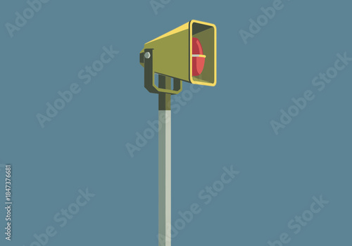 Yellow traffic signal device with red light on a pole.