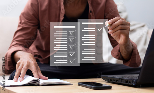 Business man working on laptop and management data with project checklist that finished at work place,business projecct concept 