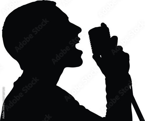 Silhouette of a singer performing with a vintage microphone