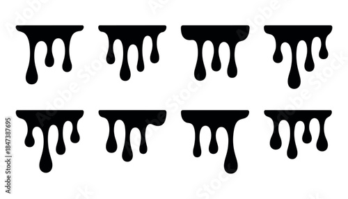 Eight black ink drips on white background abstract liquid dripping