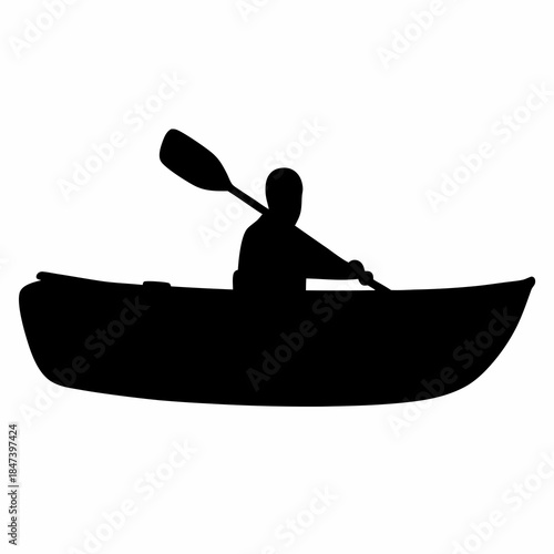 Silhouette of a kayaker paddling on the water in black and white