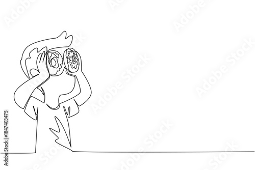 One line drawing of a boy holding two donuts like glasses, expressing joy and creativity, representing a playful food concept for National Donut Day celebration.