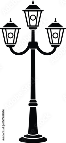 Classic triple lantern street lamp silhouette icon featuring vintage outdoor lighting post decorative urban design isolated white background