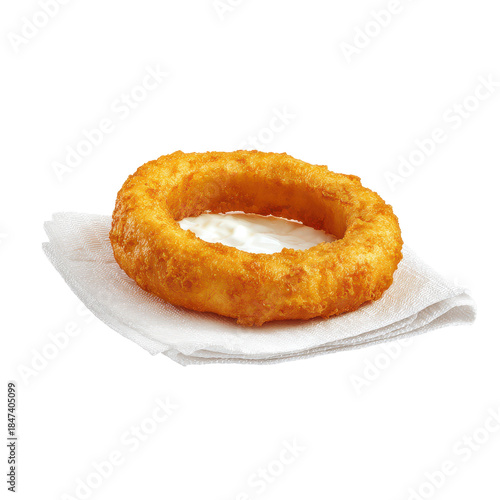 Crispy fried onion ring served with creamy dip on a napkin. or transparent background