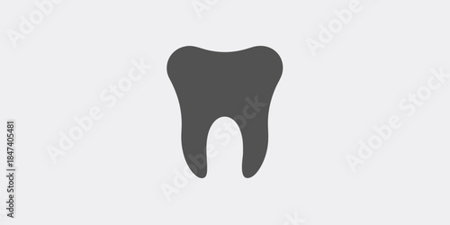 A simple black silhouette of a single human tooth on a light background