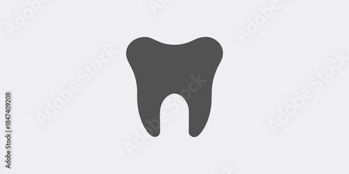 Simple illustration of a single dark gray tooth against a light background