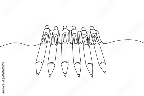 Continuous line drawing shows several ballpoint pens aligned together, representing stationery essentials for writing, learning, and business in celebration of National Ballpoint Pen Day.
