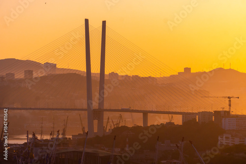 Golden bridge across the Golden Horn Bay in Vladivostok at dawn