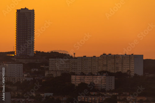 Urban development of Vladivostok at dawn. Bright dawn in Vladivostok.
