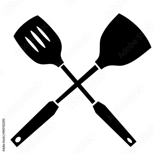 Bold black silhouette of a crossed slotted spatula and turner spatula. Represents cooking, chef, kitchen tools, restaurant, catering, culinary arts, and food preparation.