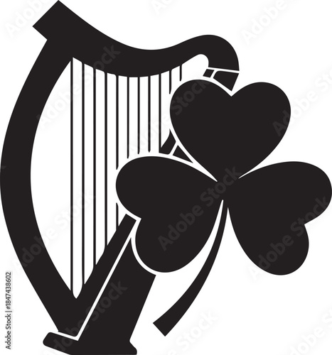 Black silhouette of an irish harp and a shamrock