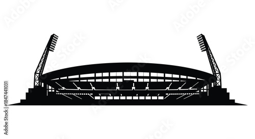 A striking black and white image depicting a large sports stadium in detailed silhouette