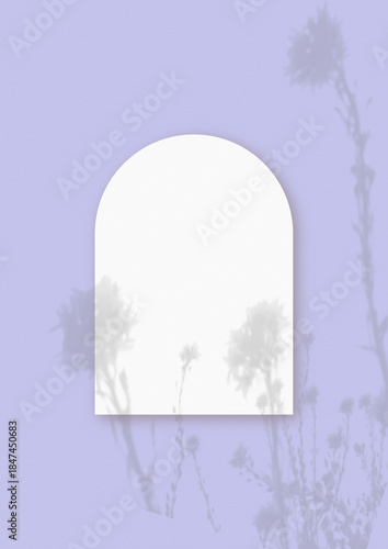 Wallpaper Mural Natural light casts shadows from wildflowers on an arched sheet of white paper lying on a vertical purple background. Mockup Torontodigital.ca