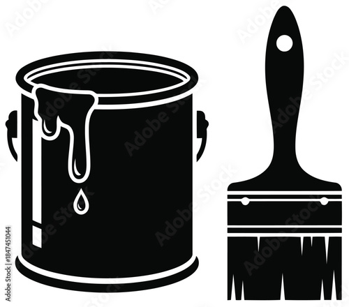 Black paint can with dripping paint and paintbrush