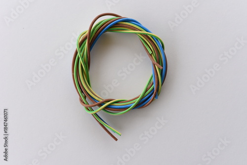 Coiled electrical cables isolated on white background