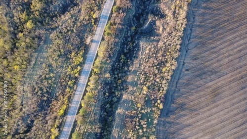 flying over an abyss in the forest on a drone