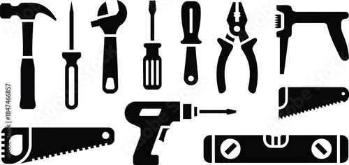 Collection of black silhouette hand tools and power drill.