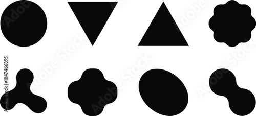 Set of eight black abstract geometric and organic shapes.