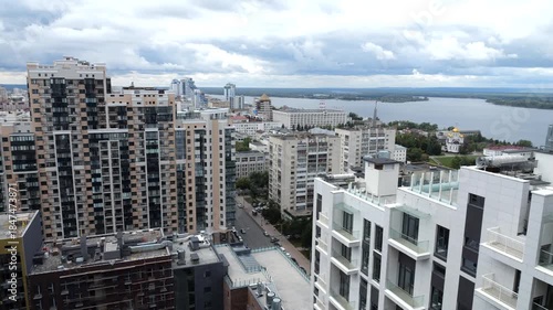 Urban landscape with high-rise buildings and river. Russia, Samara