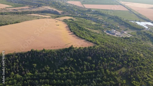 flying a drone above planes and forest
