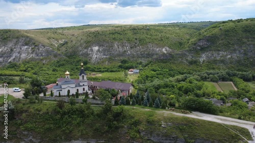 flying a drone above river in Old Orhei