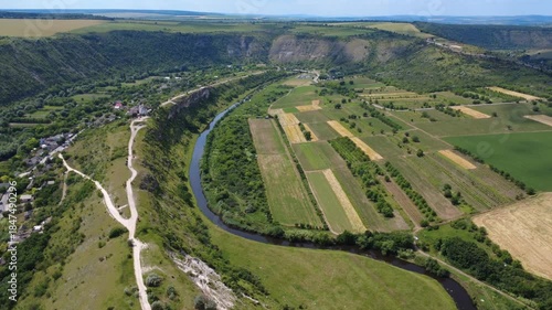 flying a drone above river in Old Orhei