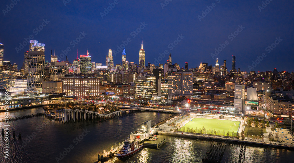 Obraz premium Lower Manhattan skyline. New York aerial view of Manhattan skyscrapers. NYC aerial cityscape. New York City Hudson skyline. New York waterfront. NYC skyscrapers at night, panoramic skyline.