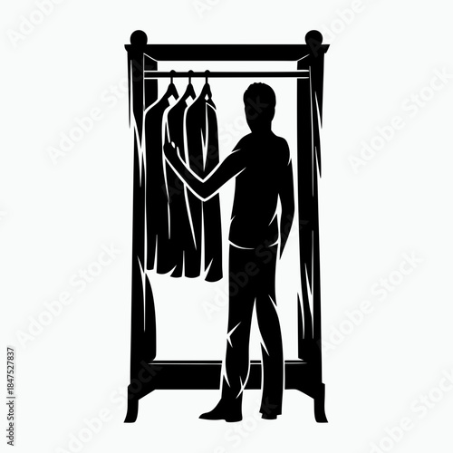 Man choosing clothes in a closet silhouette on white background