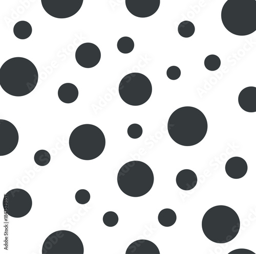 A seamless pattern of scattered dark grey circles of varying sizes on a clean white background Keywords