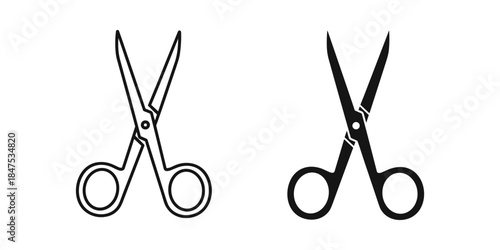 Two pairs of scissors side by side