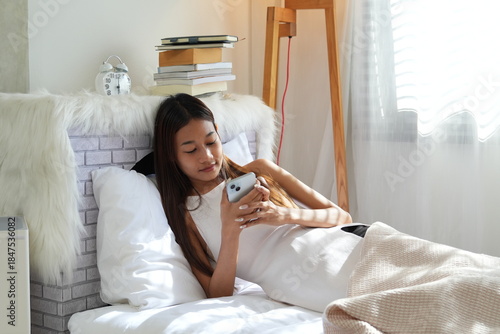 A teenage girl wakes up in the morning and does activities before taking a shower