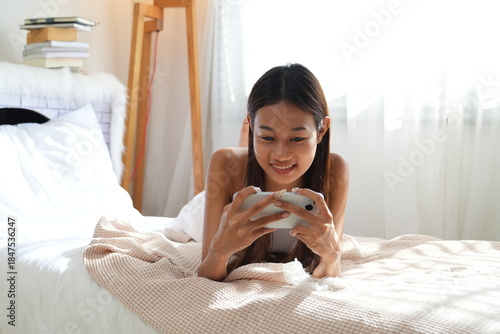 A teenage girl wakes up in the morning and does activities before taking a shower