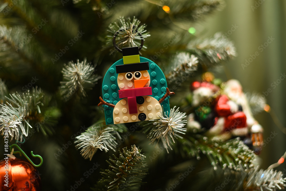 Fototapeta premium New Year's decorations for the tree. Lego snowman