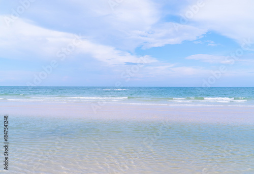 Beautiful tropical beach with clear blue sea and sky, clean banner background with copy space