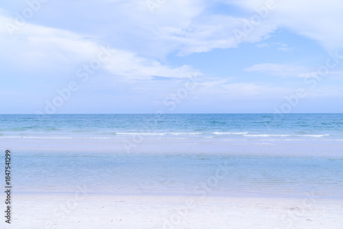 Beautiful tropical beach with clear blue sea and sky, clean banner background with copy space