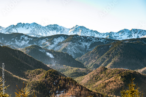 Fototapeta Naklejka Na Ścianę i Meble -  Panoramic View of the Tatra Mountains with Snow-Capped Peaks