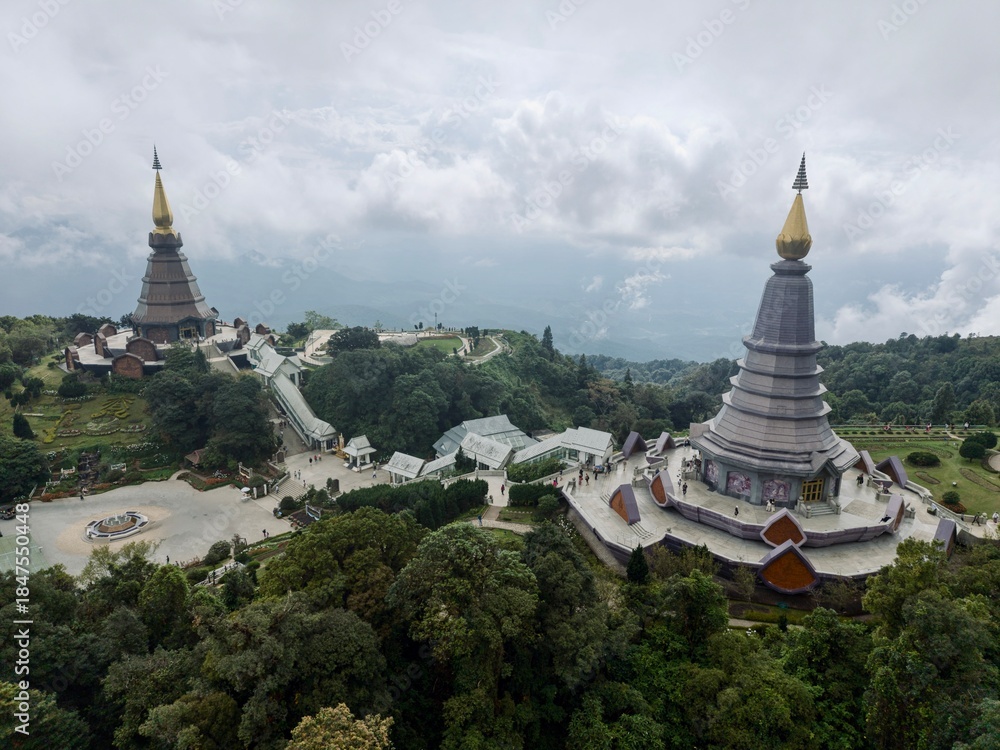 Naklejka premium Wide aerial of twin royal pagodas on Doi Inthanon ridge